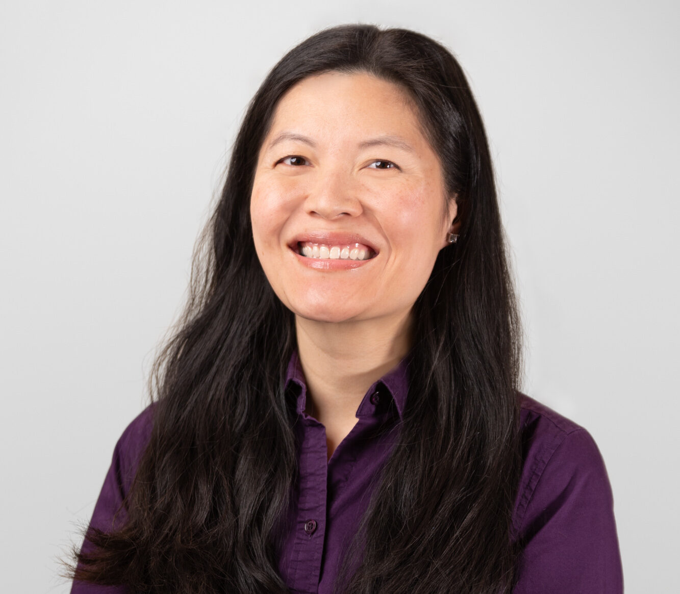Headshot of Wenfei Xie, MD, Dermatologist at Kansas City Skin and Cancer Center.